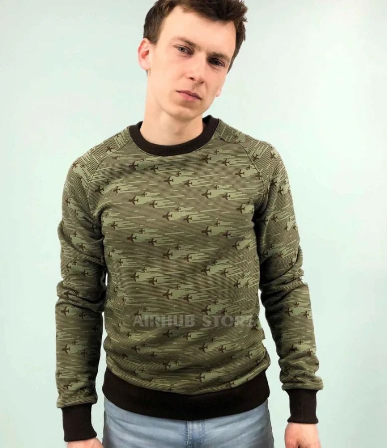 Khaki sweatshirt trail of airplanes