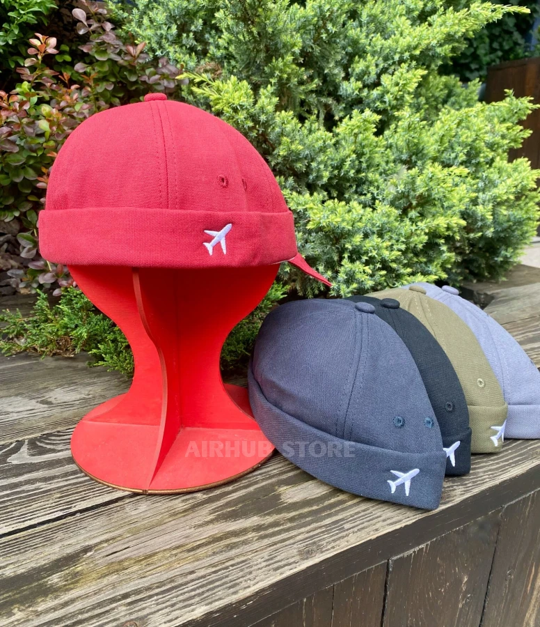 Docker cap with an airplane