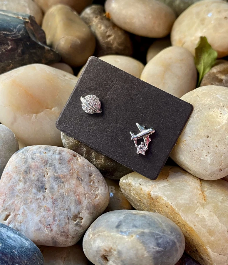 Airplane and Saturn earrings