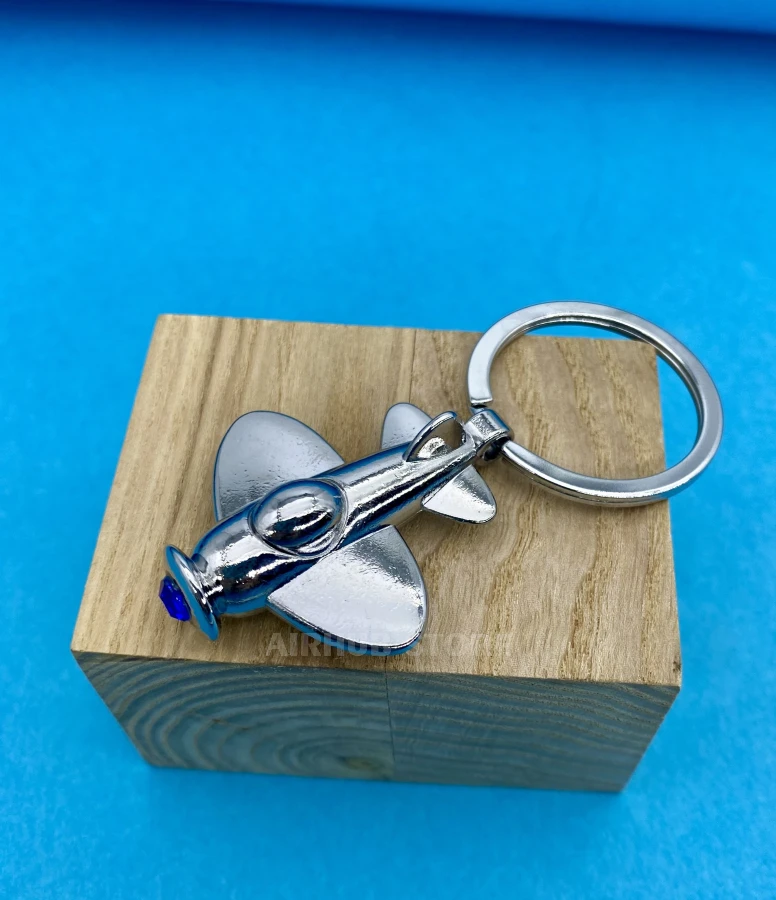 Airplane with a blue stone keychain