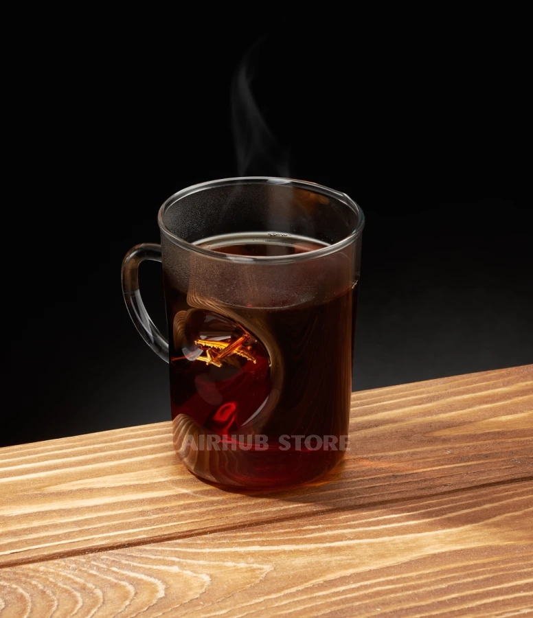 Glass coffee/tea cup with an airplane