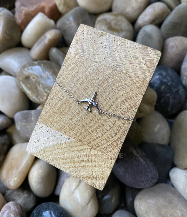 Bracelet with airplane flight