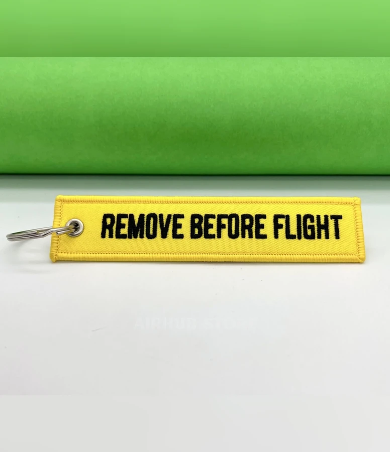 Remove Before Flight yellow Keychain